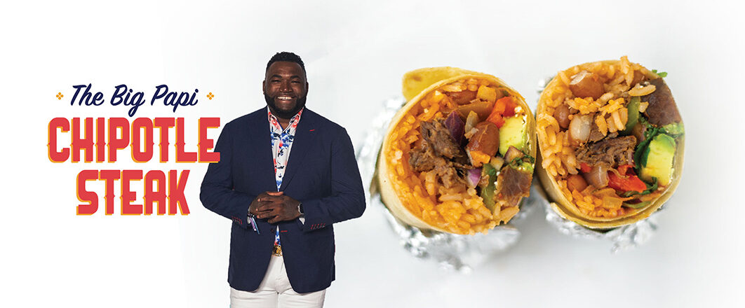 An image of Big Papi with the Chipotle Steak burrito, featuring steak, chipotle sauce, sweet peppers, fajita veggies, sliced avocado, rice, pinto beans, cilantro, and onions